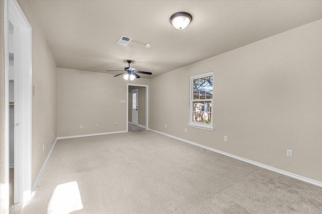 120 Southwinds Dr, Weatherford, TX 76087 - empty room with visible vents, light colored carpet, baseboards, and ceiling fan