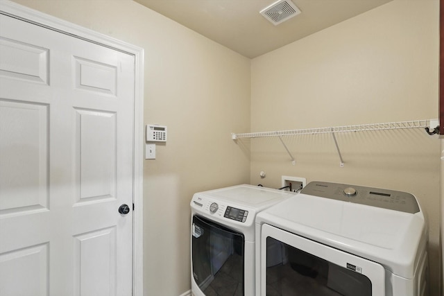 3505 Mustang Dr, Denton, TX 76210 - laundry area featuring washing machine and dryer