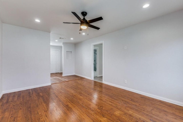 1312 Greenwood Dr, Garland, TX 75041 - empty room featuring baseboards, wood finished floors, ceiling fan, and recessed lighting