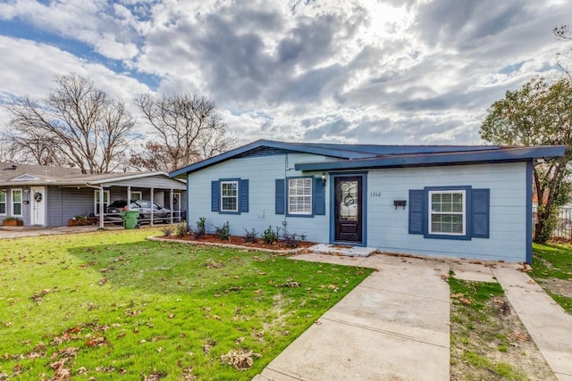 1312 Greenwood Dr, Garland, TX 75041 - single story home featuring a front lawn