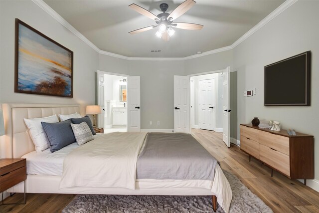10 Monticello Ct, Mansfield, TX 76063 - bedroom featuring ornamental molding, wood finished floors, ensuite bathroom, baseboards, and ceiling fan