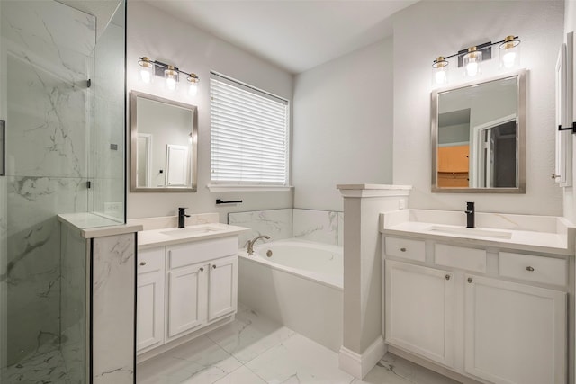 10 Monticello Ct, Mansfield, TX 76063 - bathroom featuring marble look tiles, a bath, two vanities, and a marble finish shower