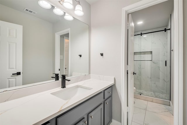 10 Monticello Ct, Mansfield, TX 76063 - bathroom with marble look tiles, a marble finish shower, toilet, and vanity