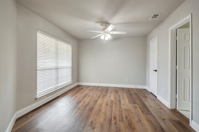 10 Monticello Ct, Mansfield, TX 76063 - spare room with a ceiling fan, baseboards, and hardwood / wood-style floors