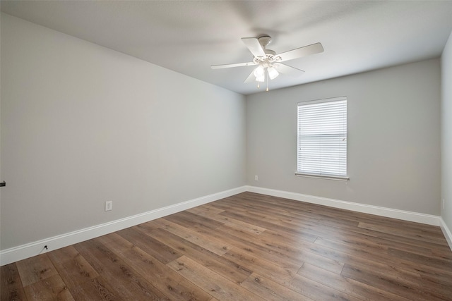 10 Monticello Ct, Mansfield, TX 76063 - empty room with a ceiling fan, baseboards, and wood finished floors