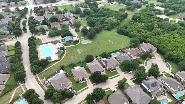 10 Monticello Ct, Mansfield, TX 76063 - aerial view of property and surrounding area featuring a pool and nearby suburban area