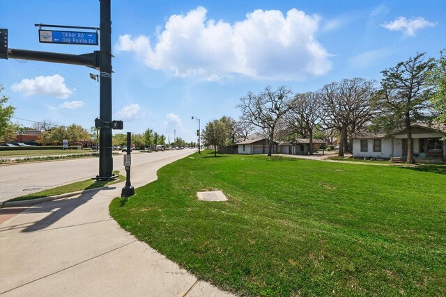 1509 Tinker Rd, Colleyville, TX 76034 - exterior space with sidewalks and street lighting