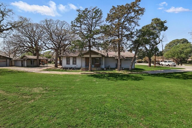 1509 Tinker Rd, Colleyville, TX 76034 - view of front of property featuring a front lawn