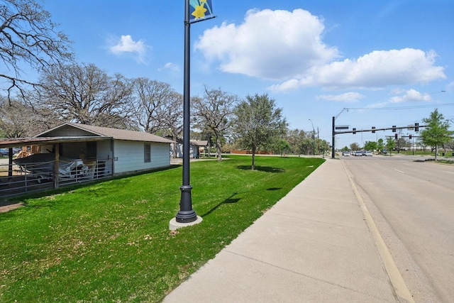 1509 Tinker Rd, Colleyville, TX 76034 - exterior space with sidewalks, an exterior structure, traffic lights, and curbs