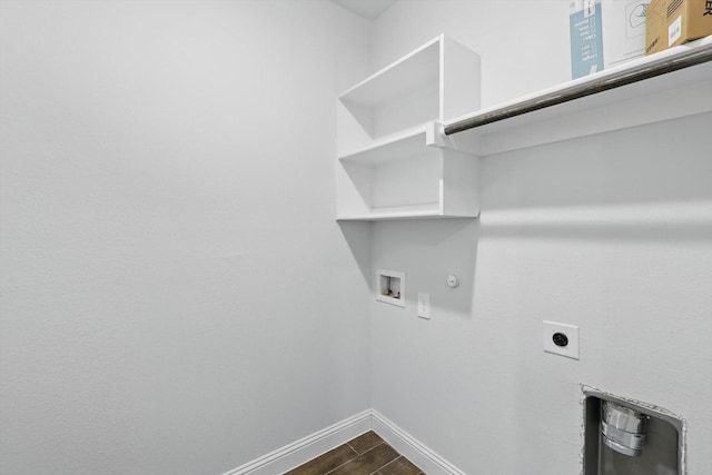 clothes washing area featuring hookup for a gas dryer, hookup for a washing machine, baseboards, hookup for an electric dryer, and dark wood-style flooring