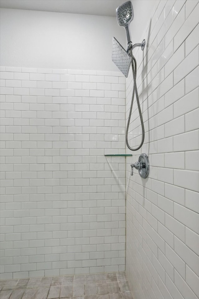 bathroom view of tiled shower