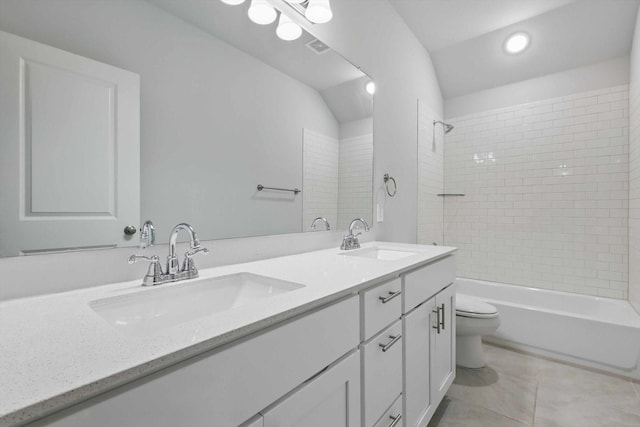 full bathroom featuring toilet, tile patterned floors, double vanity, recessed lighting, and bathing tub / shower combination