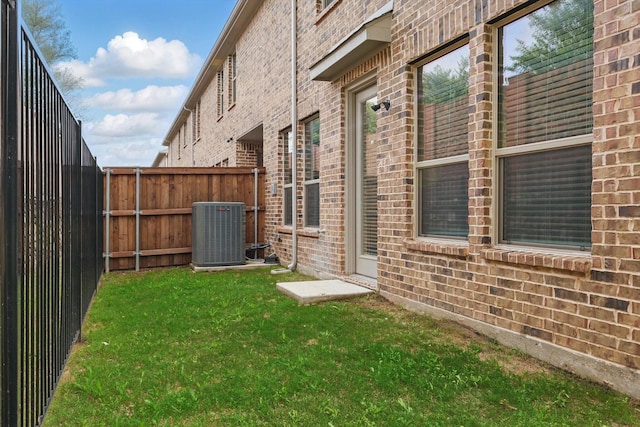 view of yard featuring central AC