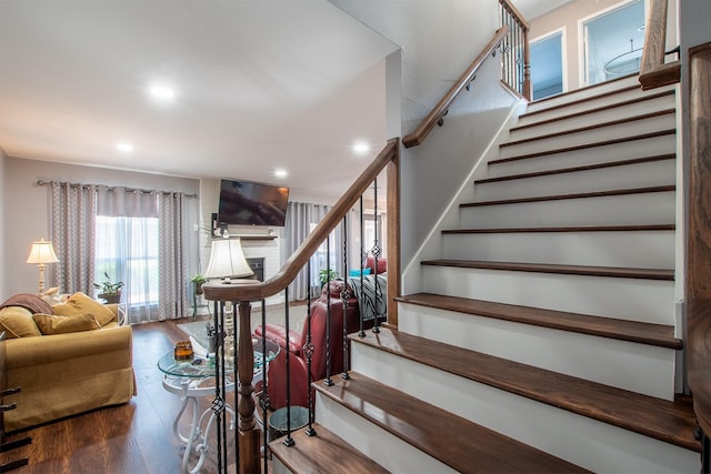 8617 Fairfax Ave, Rowlett, TX 75089 - staircase featuring wood finished floors and recessed lighting