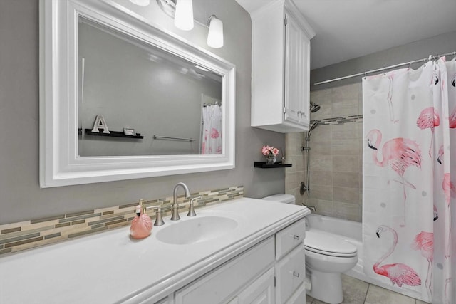 full bathroom with toilet, tile patterned floors, shower / tub combo, and vanity
