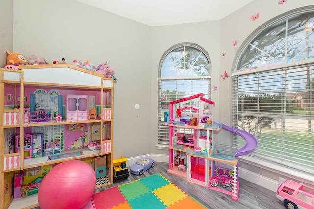 4315 Elgin Ct, Grand Prairie, TX 75052 - rec room featuring baseboards and wood finished floors