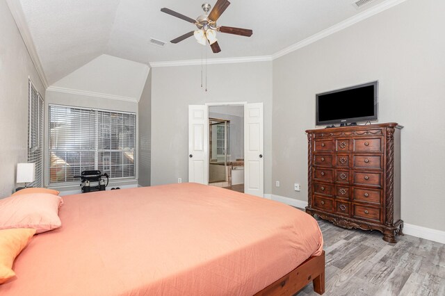 4315 Elgin Ct, Grand Prairie, TX 75052 - bedroom featuring baseboards, wood finished floors, vaulted ceiling, ornamental molding, and ensuite bath