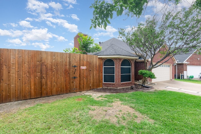 4315 Elgin Ct, Grand Prairie, TX 75052 - view of front of home featuring a garage, driveway, brick siding, and roof with shingles