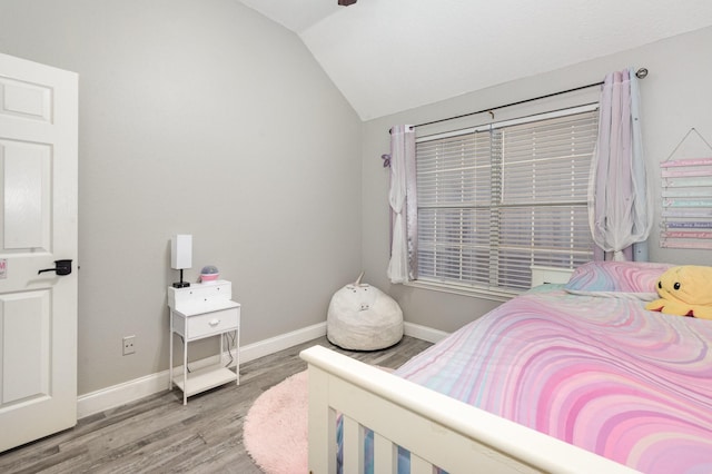 4315 Elgin Ct, Grand Prairie, TX 75052 - bedroom with vaulted ceiling, wood finished floors, and baseboards
