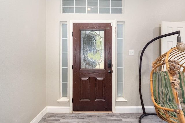 4315 Elgin Ct, Grand Prairie, TX 75052 - foyer entrance with wood finished floors and baseboards