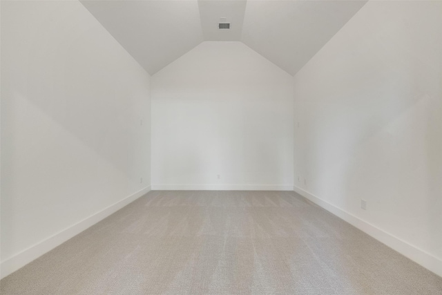 814 Montrose Dr, Rockwall, TX 75087 - bonus room with lofted ceiling, light carpet, and baseboards