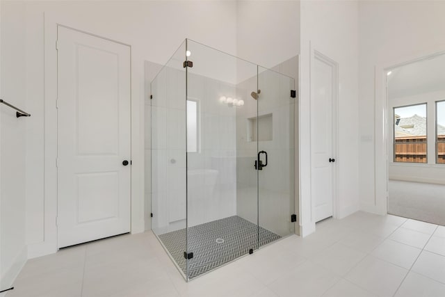 814 Montrose Dr, Rockwall, TX 75087 - bathroom featuring a shower stall, tile patterned flooring, and baseboards