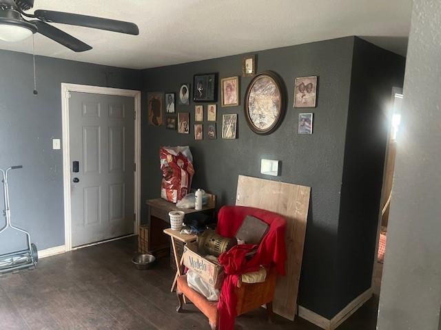 3614 Lovingood Dr, Dallas, TX 75241 - entryway featuring wood finished floors, ceiling fan, and baseboards