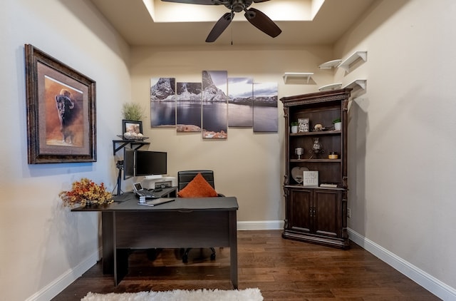 office featuring baseboards, a ceiling fan, and wood finished floors