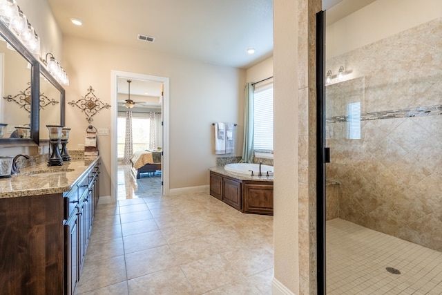 bathroom with a tile shower, ensuite bathroom, visible vents, tile patterned flooring, and a garden tub