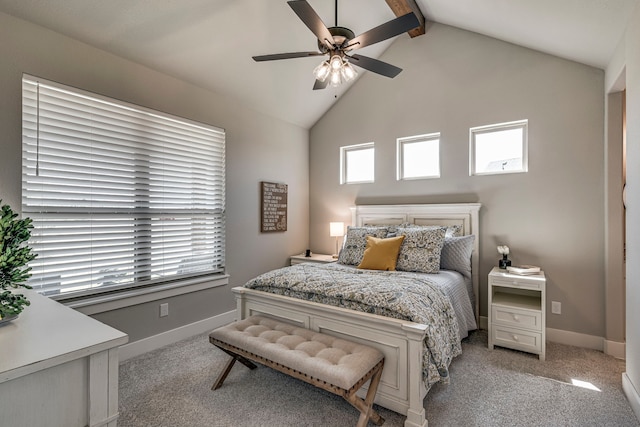 bedroom with lofted ceiling with beams, ceiling fan, baseboards, and light carpet