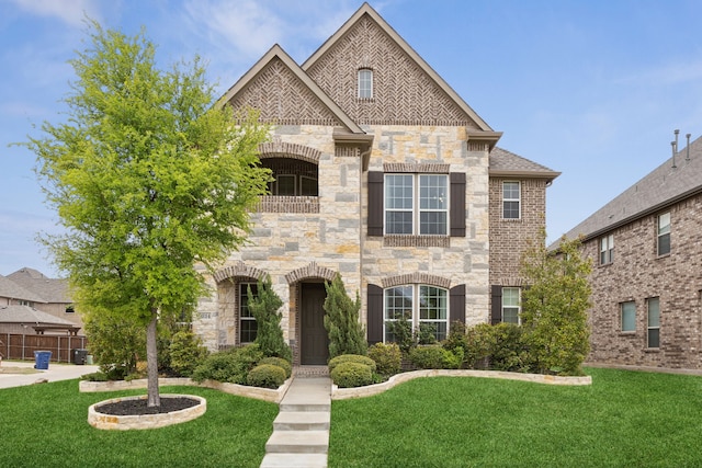 9814 Gristmill Ln, Frisco, TX 75035 - french provincial home with stone siding and a front yard