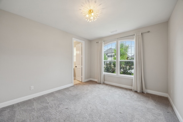9814 Gristmill Ln, Frisco, TX 75035 - spare room with baseboards, visible vents, and carpet flooring