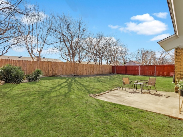view of yard featuring a fenced backyard and a patio