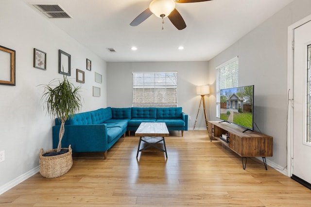 4131 Odessa St, Dallas, TX 75212 - living area with a ceiling fan, baseboards, light wood finished floors, and visible vents