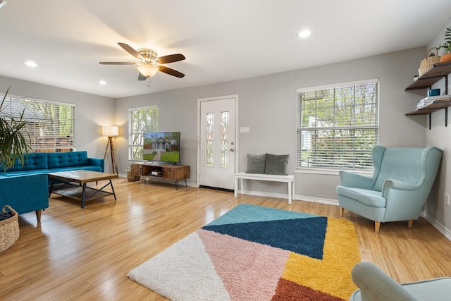 4131 Odessa St, Dallas, TX 75212 - living room with plenty of natural light, baseboards, wood finished floors, and ceiling fan