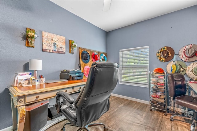 4520 Hiland Dr, Beverly Hills, TX 76711 - office area featuring baseboards and wood finished floors