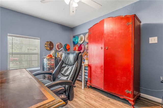 4520 Hiland Dr, Beverly Hills, TX 76711 - office with baseboards, wood finished floors, and a ceiling fan