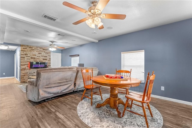 4520 Hiland Dr, Beverly Hills, TX 76711 - dining room with baseboards, ceiling fan, visible vents, and wood finished floors