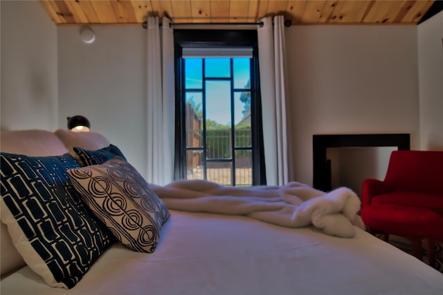 bedroom featuring wooden ceiling