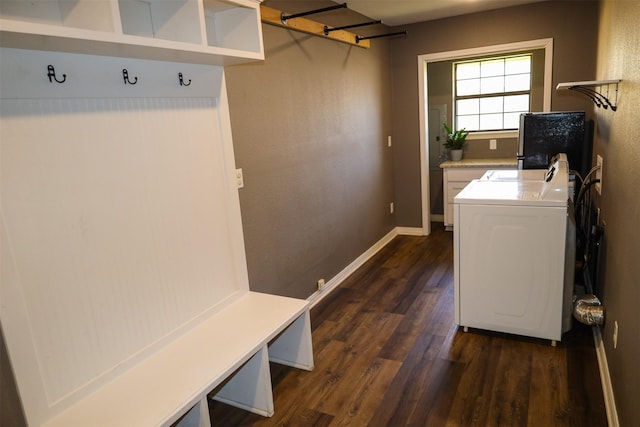 502 Parklane Dr, Bossier City, LA 71111 - laundry room with washer / clothes dryer, dark wood-type flooring, baseboards, and laundry area
