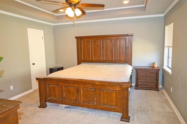 502 Parklane Dr, Bossier City, LA 71111 - bedroom featuring baseboards, a tray ceiling, crown molding, and light carpet