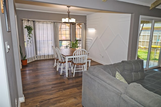 502 Parklane Dr, Bossier City, LA 71111 - dining area with dark wood-style flooring, ornamental molding, and a chandelier