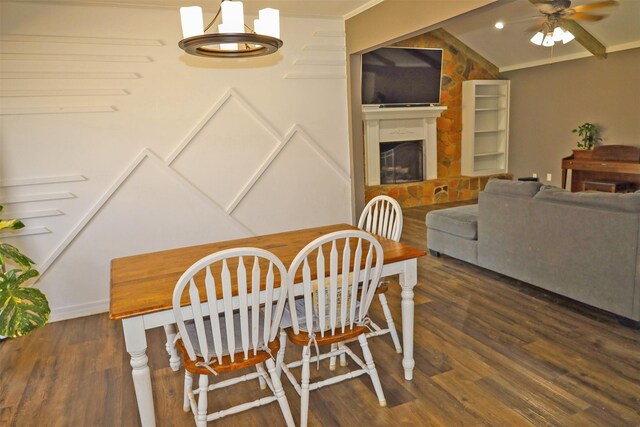 502 Parklane Dr, Bossier City, LA 71111 - dining area featuring vaulted ceiling, a ceiling fan, a fireplace, wood finished floors, and ornamental molding