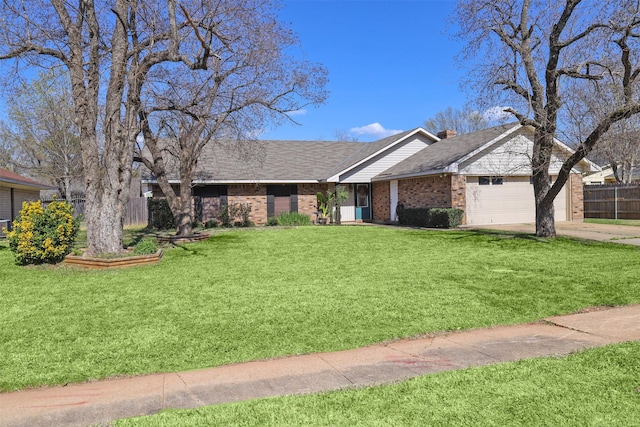 502 Parklane Dr, Bossier City, LA 71111 - ranch-style home featuring a front yard, concrete driveway, fence, brick siding, and a garage