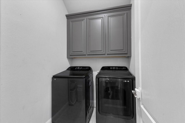 7413 Windy Meadow Dr, Little Elm, TX 76227 - clothes washing area with cabinet space, independent washer and dryer, tile patterned flooring, and baseboards