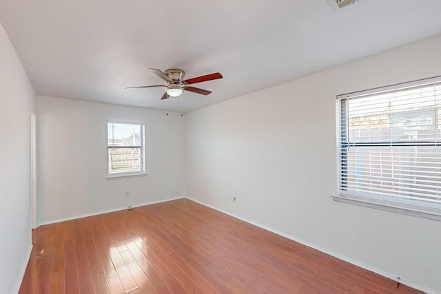 6225 Sunnybrook Dr, Watauga, TX 76148 - empty room featuring a ceiling fan and wood finished floors