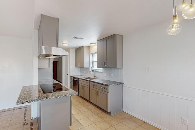 6225 Sunnybrook Dr, Watauga, TX 76148 - kitchen with black electric stovetop, exhaust hood, gray cabinets, decorative backsplash, and a kitchen breakfast bar