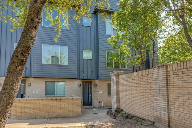 3023 Clamath Dr, Dallas, TX 75204 - view of property featuring brick siding and board and batten siding