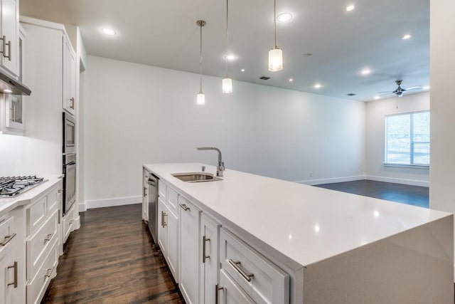 3023 Clamath Dr, Dallas, TX 75204 - kitchen with a sink, dark wood-type flooring, recessed lighting, a ceiling fan, and a center island with sink