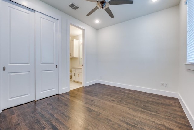 3023 Clamath Dr, Dallas, TX 75204 - unfurnished bedroom featuring baseboards, dark wood-style flooring, a closet, recessed lighting, and ensuite bathroom